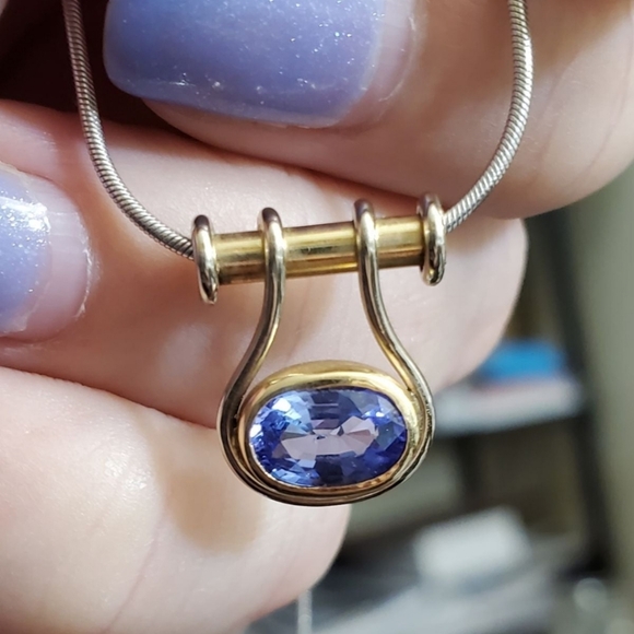 Stampd Jewelry - 14k tanzanite necklace! White gold snake chain and the pendant is yellow gold. T